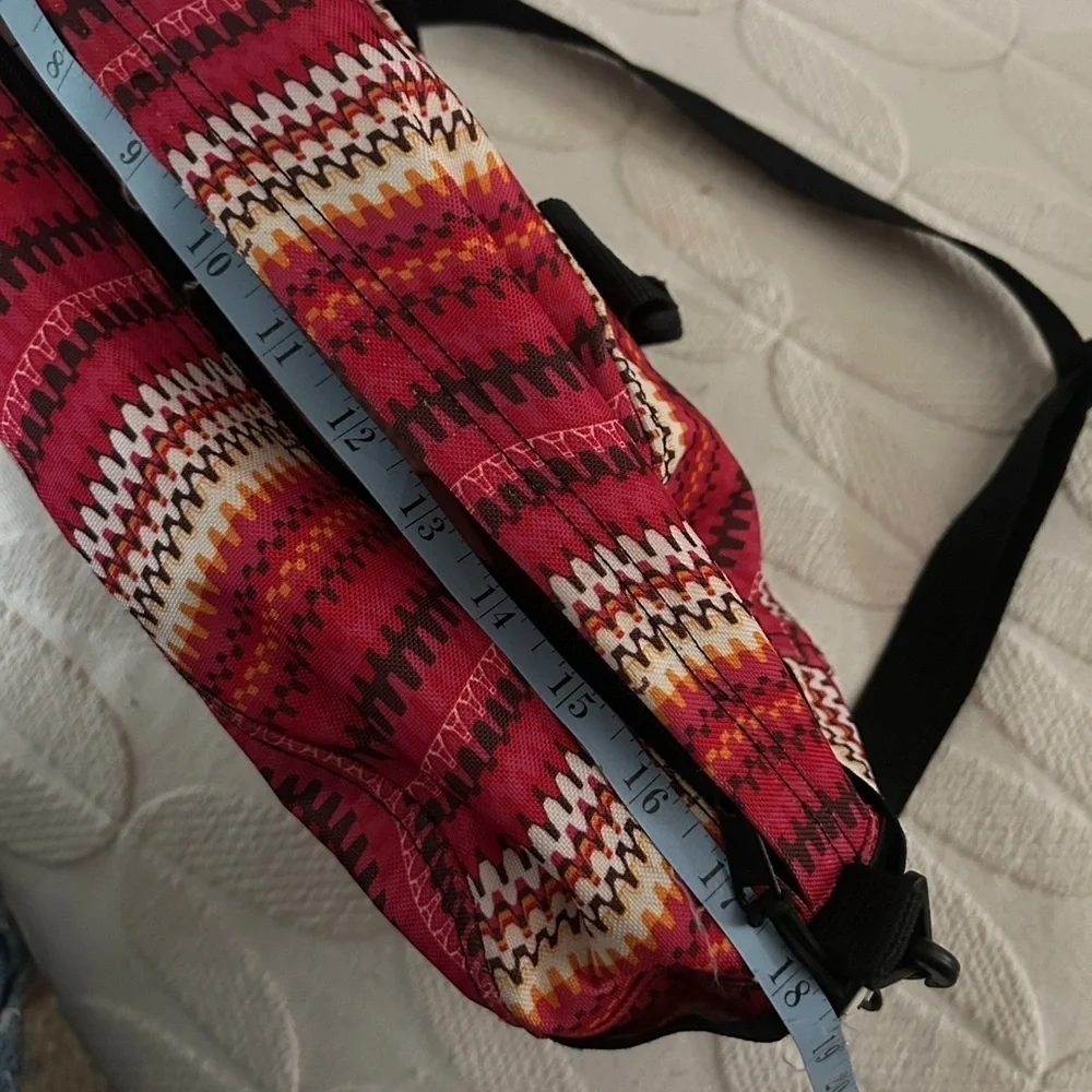 Like new YakPak duffle bag. Pink colorful zigzag design with black details